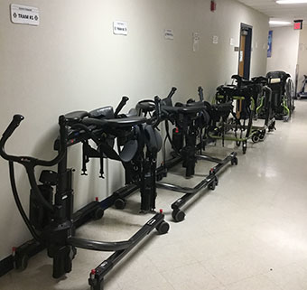 A picture of Rifton adaptive equipment parked in the hallways of the Langan School.