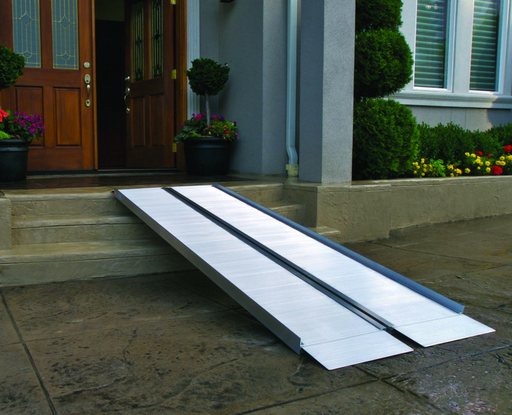 Collapsible handicap ramp set over stairs