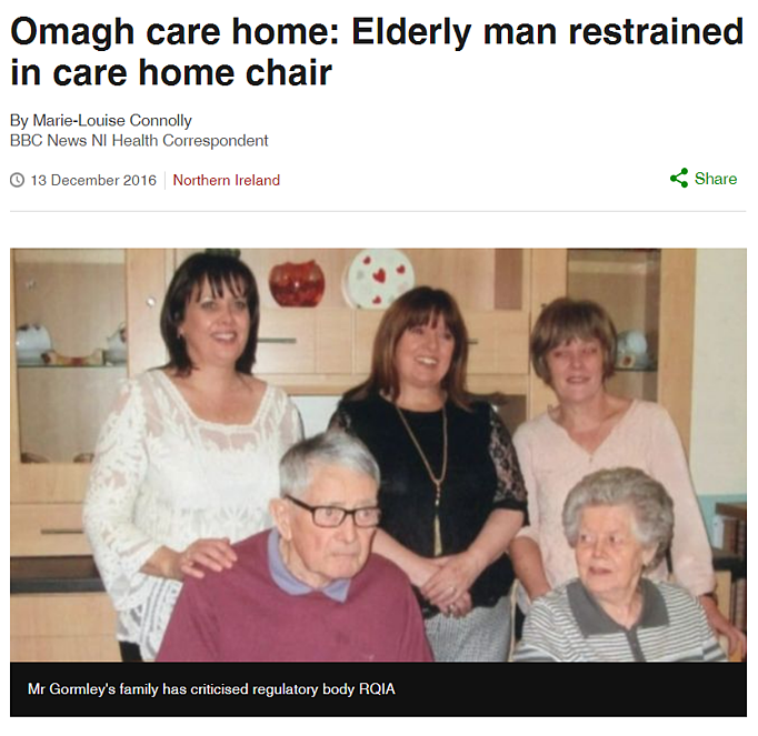 Elderly Man Restrained in Care Home Chair.png