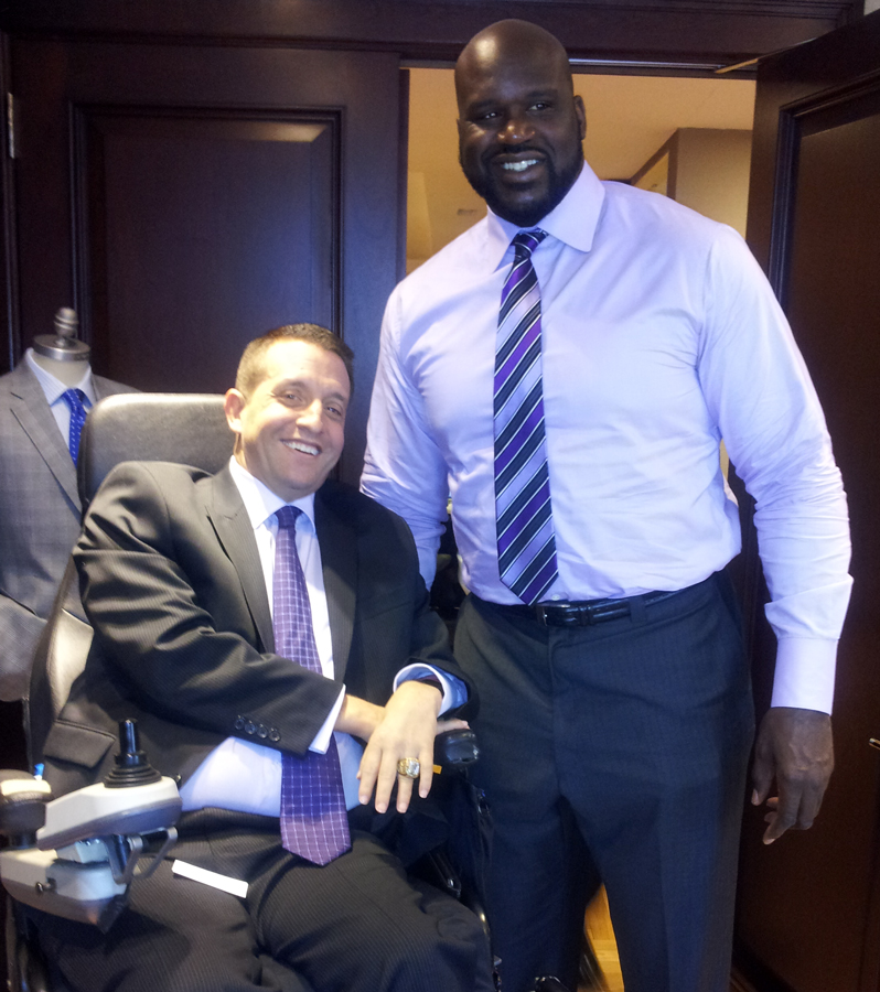 Sports agent Alan Brown, pictured with Shaquille O’Neal, was one of the few people to get insurance to cover the original iBOT.