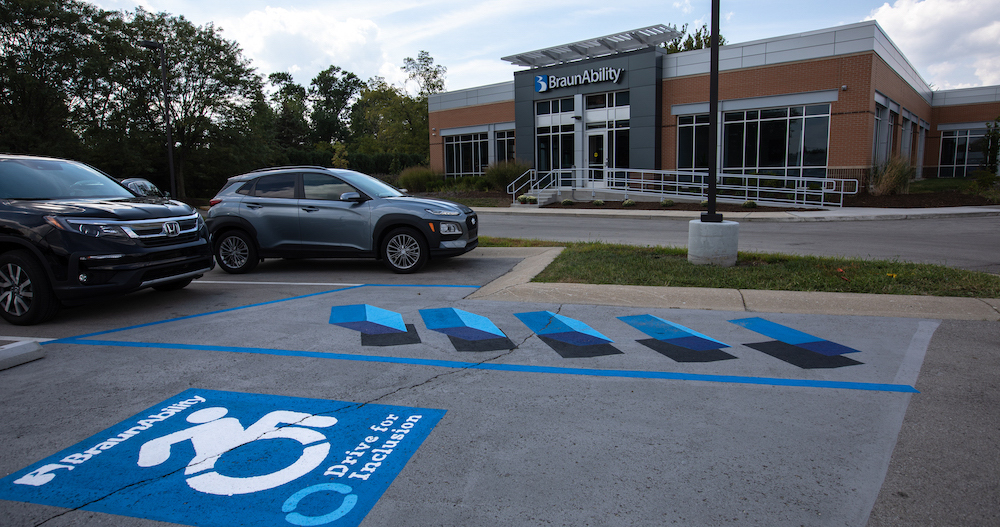 As part of its Drive for Inclusion, BraunAbility painted 3D spaces to deter nondisabled people from parking on the stripes.