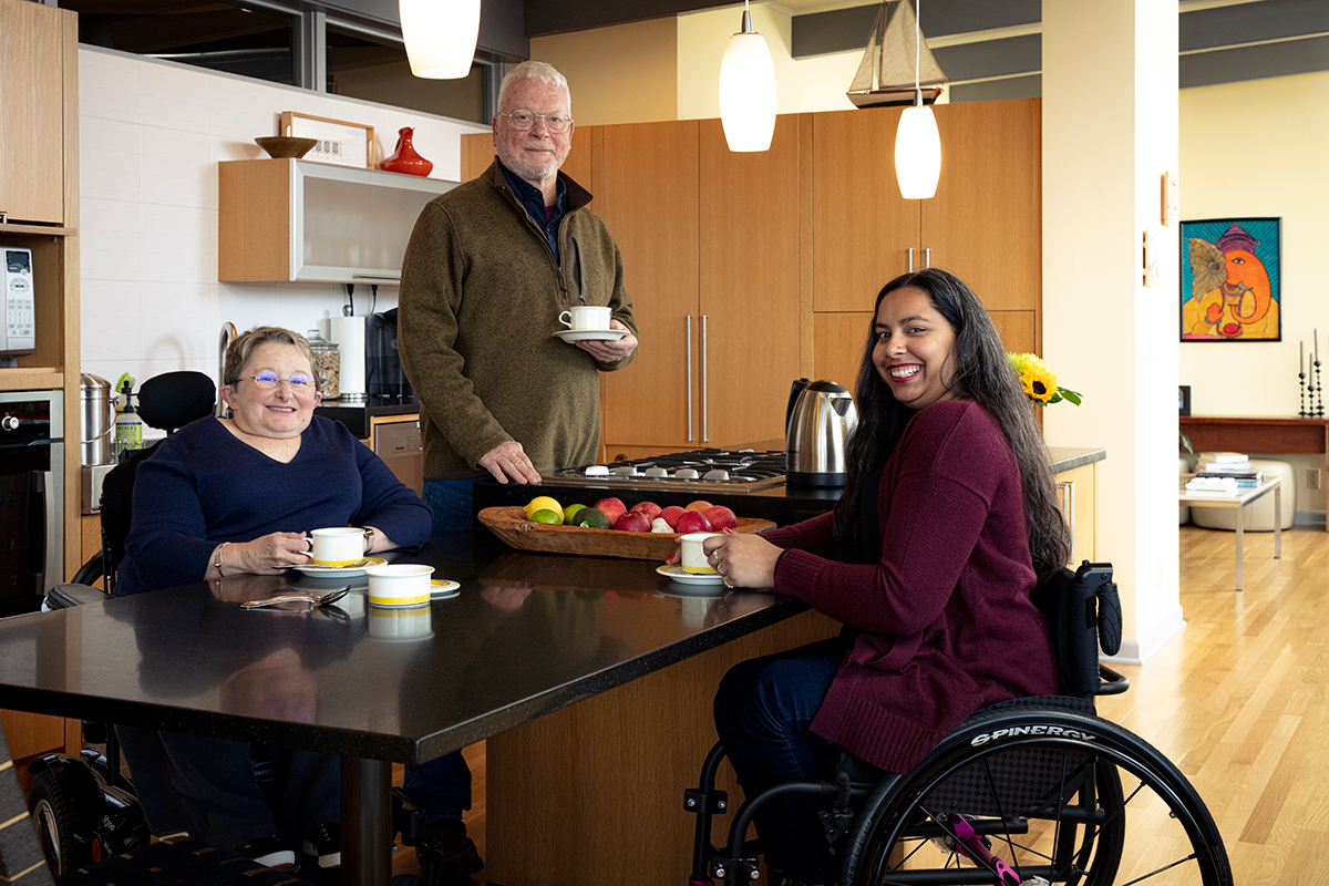 Braitmayer shares breakfast with her husband, David Erskine, and their daughter, Anita. Note how well this room accommodates the family, from table height to the space between appliances and cabinets to how the kitchen flows into the living room behind it.