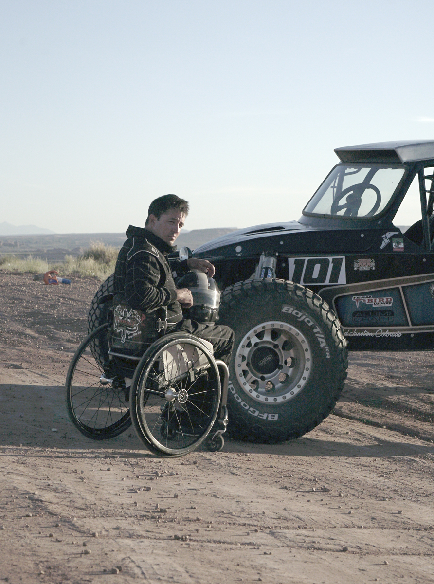 Andy Blood poses in front of one of his race team’s Class 1 buggies.